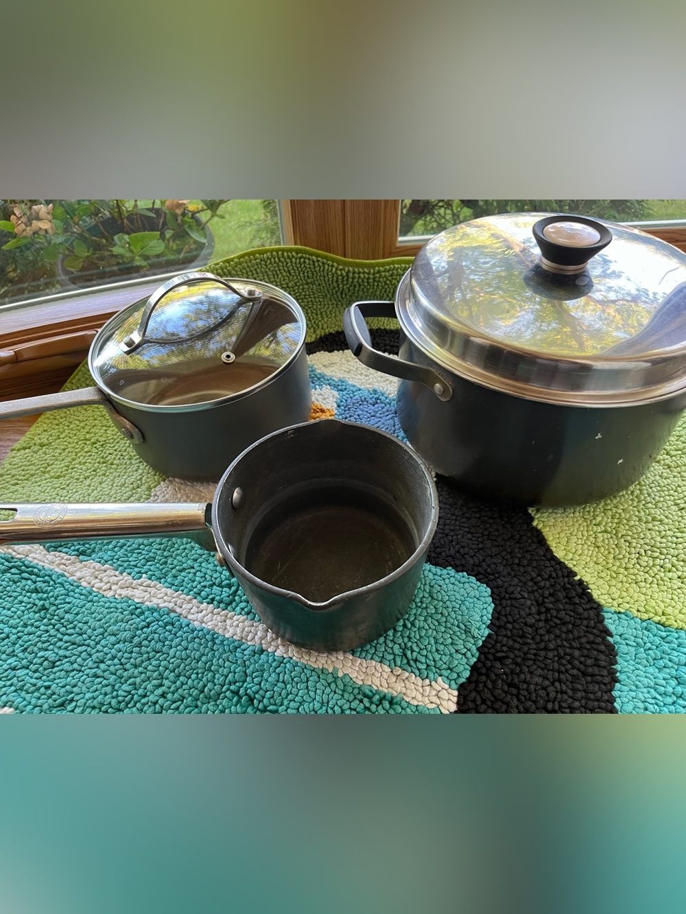Set of 3 pots / 2 lids… $20.00 … as is 2 1/2 qt, 1 1/4”, a large double handed p